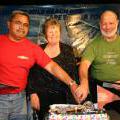 Celebrating 21 years, Neil Anderson and Peter Rawlings of Raw Country with organiser Shirley May/PHOTO Donna Russell